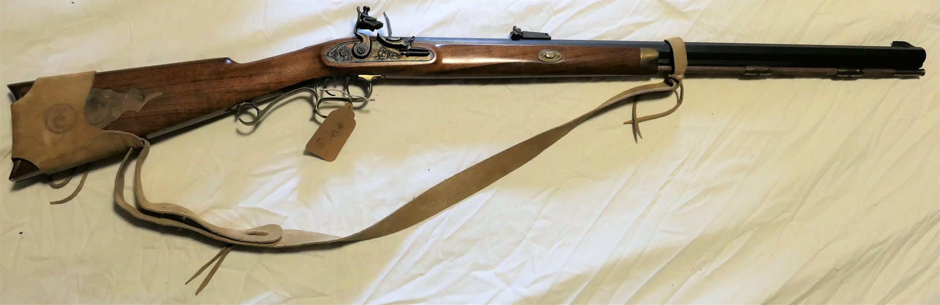 Thompson Center Arms . 45 Caliber Black Powder Long Rifle - Double Trigger with Brass Patch Box and Leather Sling Strap