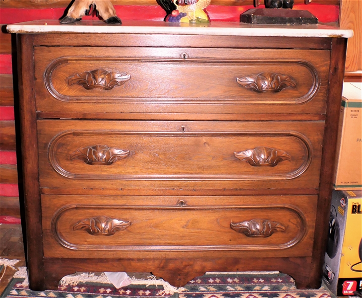 Walnut Marble Top Chest with Carved Pulls - Measures 36" tall 41" by 18"