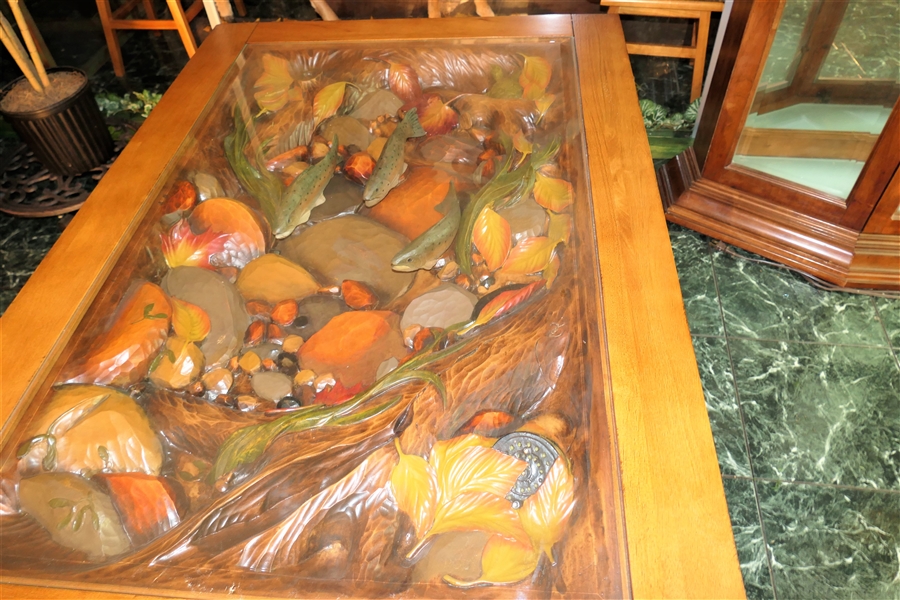 Big Sky Carvers Coffee Table with  Fish and River Scene-Beveled Glass Top -  Measures 18" tall 47" by 32"