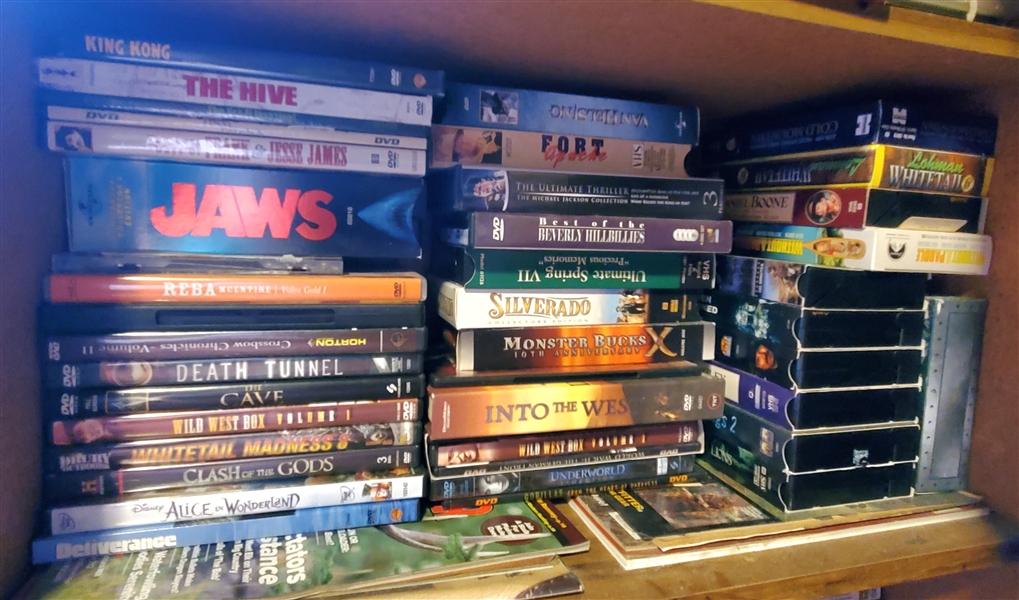 Lot of DVD and VHS Movies including JAWS, Death Tunnel, Lord of the Rings, and Classic Cowboy