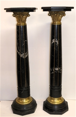 Pair of Outstanding Neoclassical Black Marble Corinthian Column Pedestals - Black Marble Top, Base, and Pedestal - Substantial Brass Corinthian Capitals - Pedestals Measure 46 Tall 13 Across