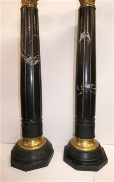 Pair of Outstanding Neoclassical Black Marble Corinthian Column Pedestals - Black Marble Top, Base, and Pedestal - Substantial Brass Corinthian Capitals - Pedestals Measure 46 Tall 13 Across