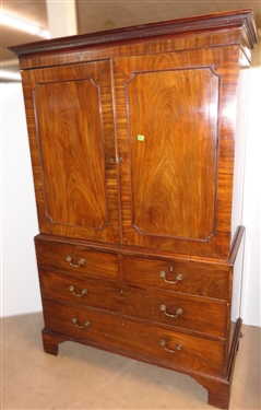 19th Century Mahogany Linen Press - Crotch Mahogany Doors - Crown Dentil Molding - Top Cabinet Has Been Converted To Wardrobe with Clothing Bar - Base with 4 Finely Dovetailed Drawers - Bracket...