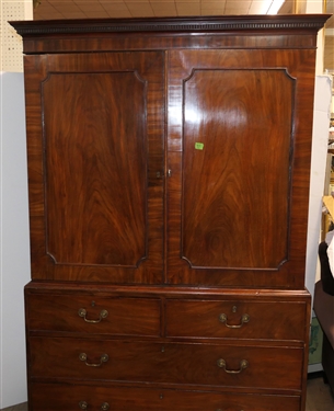 19th Century Mahogany Linen Press - Crotch Mahogany Doors - Crown Dentil Molding - Top Cabinet Has Been Converted To Wardrobe with Clothing Bar - Base with 4 Finely Dovetailed Drawers - Bracket...