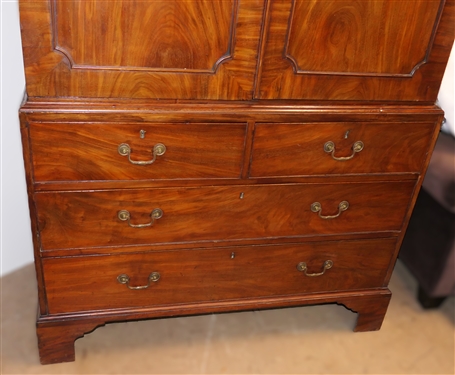 19th Century Mahogany Linen Press - Crotch Mahogany Doors - Crown Dentil Molding - Top Cabinet Has Been Converted To Wardrobe with Clothing Bar - Base with 4 Finely Dovetailed Drawers - Bracket...