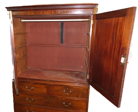 19th Century Mahogany Linen Press - Crotch Mahogany Doors - Crown Dentil Molding - Top Cabinet Has Been Converted To Wardrobe with Clothing Bar - Base with 4 Finely Dovetailed Drawers - Bracket...