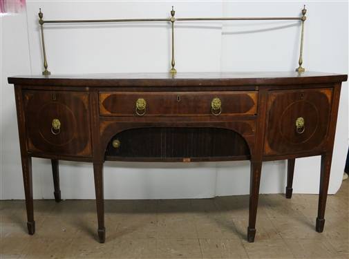 Very Fine English Regency Period Bow Front Sideboard - Outstanding Urn Inlay on Top Surface - Brass Gallery with Urn Finials Inlaid Drawer Fronts with Lions Head Pulls - Tambour Door Below Center...