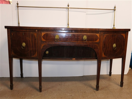 Very Fine English Regency Period Bow Front Sideboard - Outstanding Urn Inlay on Top Surface - Brass Gallery with Urn Finials Inlaid Drawer Fronts with Lions Head Pulls - Tambour Door Below Center...