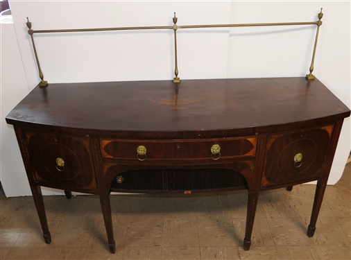 Very Fine English Regency Period Bow Front Sideboard - Outstanding Urn Inlay on Top Surface - Brass Gallery with Urn Finials Inlaid Drawer Fronts with Lions Head Pulls - Tambour Door Below Center...
