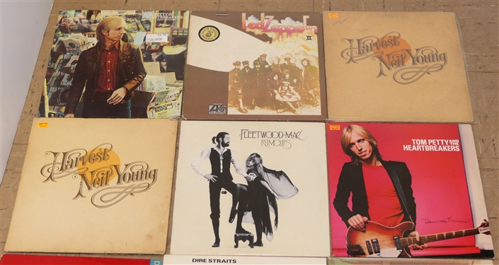 Lot of Rock and Roll Albums including Tom Petty, Led Zeppelin, Neil Young, Fleetwood Mac, Dire Straits, 1971 Rolling Stones Zipper Album, and Crosby, Stills, and Nash 