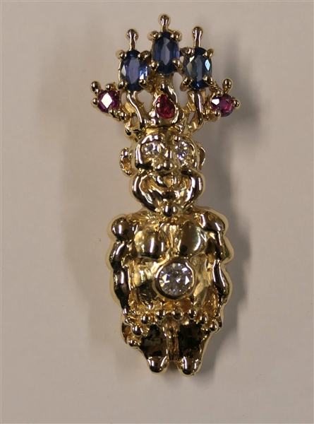 14kt Yellow Gold Tribal Figure Pendant - 1/4 Carat Round Diamond Set in Belly and Round Diamond Eyes, Sapphire and Rubies in Crown - Pendant Measures 1 5/8" Long - Weighs 10.5 Grams