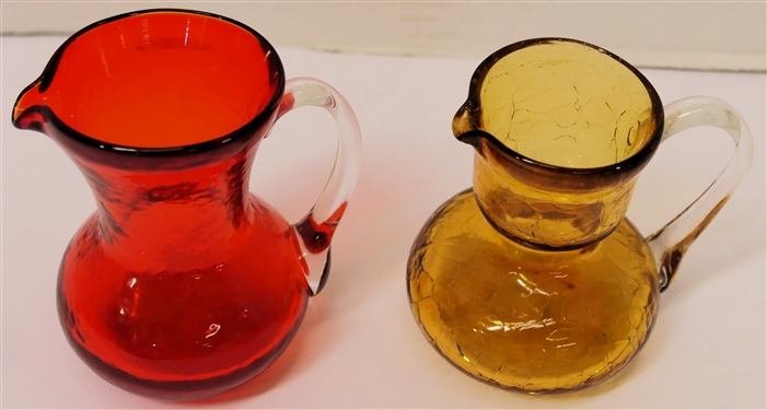 2 Hand Blown Art Glass Pitchers - Amber Crackle Glass with Clear Applied Handle and Red with Clear Applied Handle - Red Pitcher Measures 3 3/8 Tall 