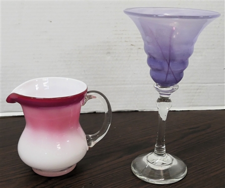 2 Pieces of Art Glass - Lavender Goblet with Clear Stem and Cranberry Case Glass Cream Pitcher - Pitcher Measures 4 1/2 Tall 