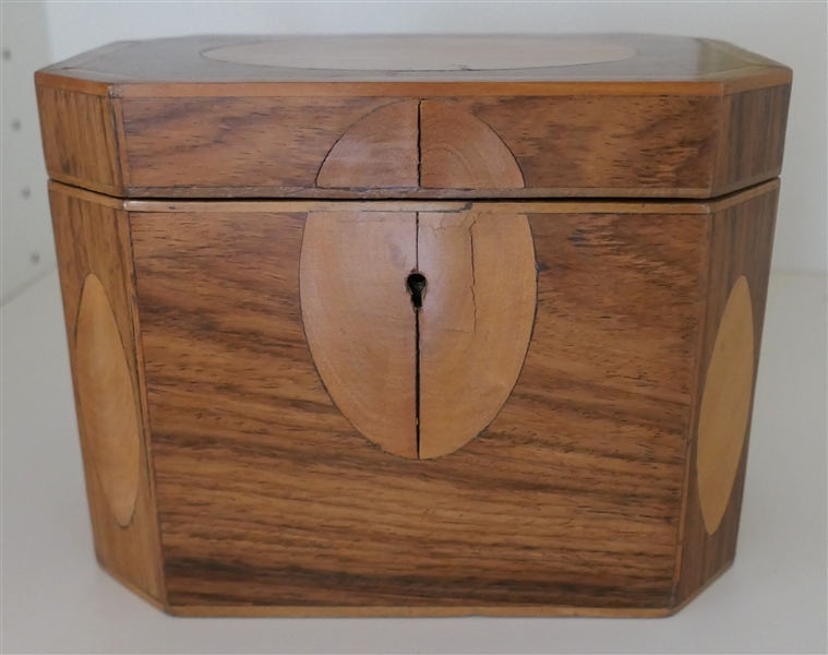 Pretty Multi Wood Inlaid Tea Caddy - Elongated Octagon Shaped Inlaid on Top and Front - Interior with 2 Divided Compartments with Wooden Lids - Box Measures 5" tall 7" by 4 1/2" 