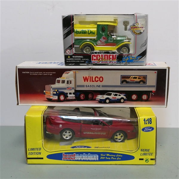 Jouef Evolution Ford Mustang Model Car, Wilco Toy and Truck in Original Box, and Golden "Mountain Dew" Gift Bank in Original Box