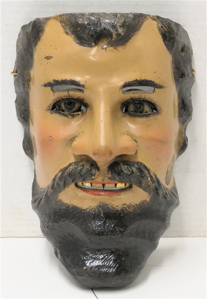 Antique Mexican Folk Art Catrin Dandy Mask - Glass Eyes, Hair Eye Lashes, Movable Eye Lids, and Gold Teeth - Mask Measures 10" by 7" Across - Some Slight Pitting To Side of Face 