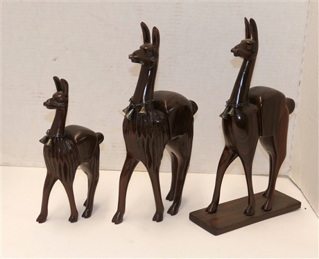 3 Hand Carved South American Wood Carved Folk Art Llama Figures with Silver Bells - Largest Llama with Wood Base Measures 11 3/4 Tall 7 Long Smallest Measures 8 1/2 Tall 