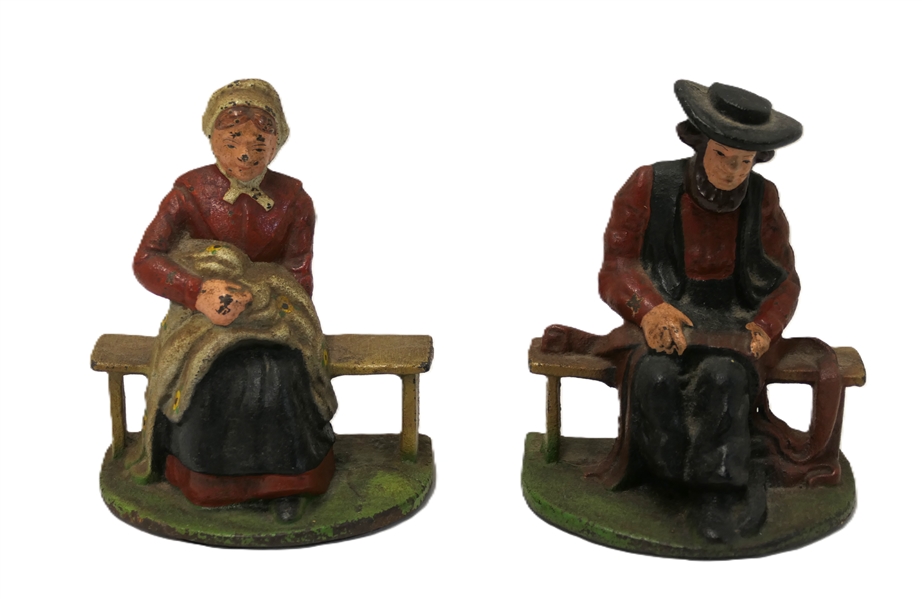 Pair of Old Cast Iron Amish Man and Woman Bookends  - Original Paint - Man is 4 1/2" Tall 4" Across