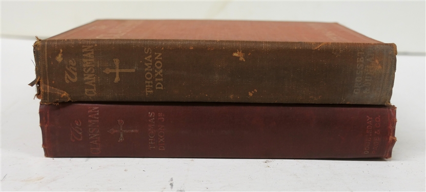 2 Copies of The Clansman by Thomas Dixon - Both 1905 Edition Hardcover Books - One Cover is Slightly Faded with Only Thomas Dixon other Darker Red with Thomas Dixon Jr. 
