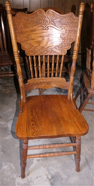 Nice Round Oak Table with 6 Oak Spindle Back Press Carved Chairs