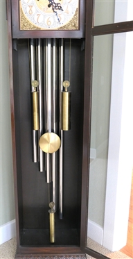 Colonial Manufacturing Co. Michigan - Tall Case / Grandfather Clock - German Movement- Chiming - with Visible Chimes - Gold and White Embossed Dial with Brass Cherubs Ormolu on Corners - Case with...
