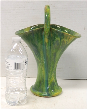 Unsigned Cole Family North Carolina Pottery Basket - Green Variegated Glaze - Basket is 9" Tall Not Including Handle - Some Minor Flakes Along Outer Edge of Basket
