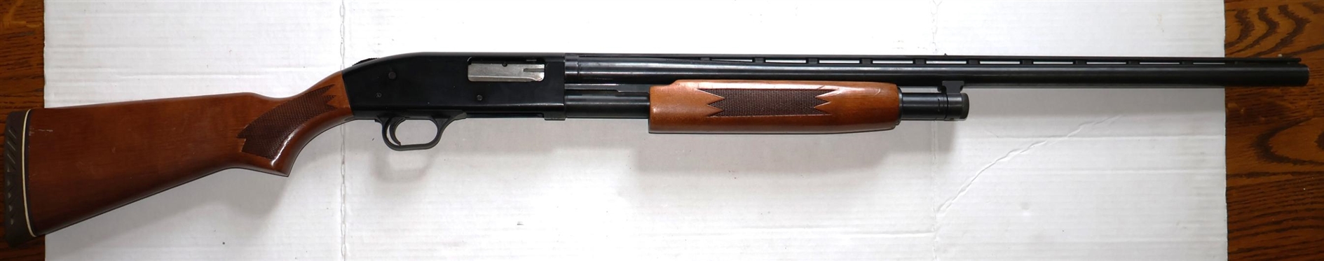 Mossberg Model 500 A 12 Gauge Shotgun - Carved Forearm and Stock - Barrel with Ventilated Rib  - Gun Transfers at RAM Arms Mt. Hermon, VA or Winsteads Auction Co. By Appointment
