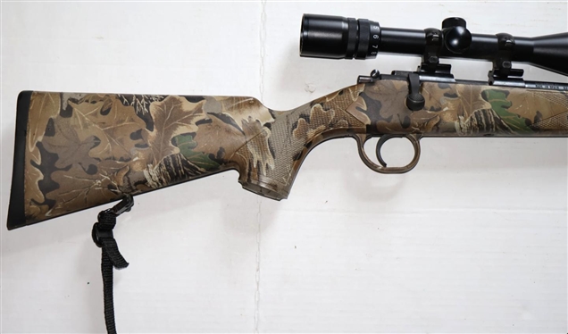 Traditions Made in Spain .50 Caliber Lightning Bolt Action Muzzle Load Black Powder Rifle -  Composite Stock with Camo Finish - With Swift Scope 