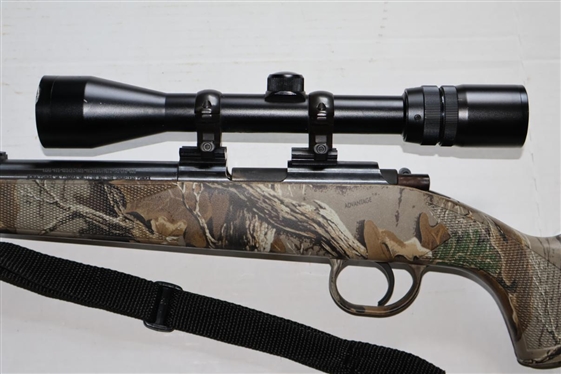 Traditions Made in Spain .50 Caliber Lightning Bolt Action Muzzle Load Black Powder Rifle -  Composite Stock with Camo Finish - With Swift Scope 