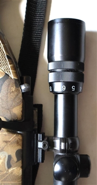 Traditions Made in Spain .50 Caliber Lightning Bolt Action Muzzle Load Black Powder Rifle -  Composite Stock with Camo Finish - With Swift Scope 