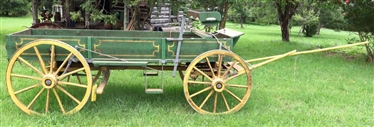 Exceptionally Nice Horse Drawn Buck Wagon Buckboard' One Horse Wagon - Wood Spoke Wheels - Painted Green and Yellow - Working Brakes, Spring Buggy Seat - Shed Kept - 9ft 8 Long