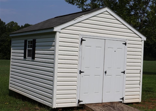 10ft by 12ft Storage Building - Double Doors, and 2 Windows -Window Unit in Top Vent - NOT WIRED - NO Contents - Buyer Must Have Moved 