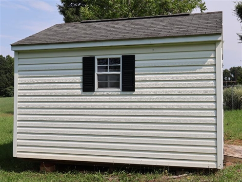 10ft by 12ft Storage Building - Double Doors, and 2 Windows -Window Unit in Top Vent - NOT WIRED - NO Contents - Buyer Must Have Moved 