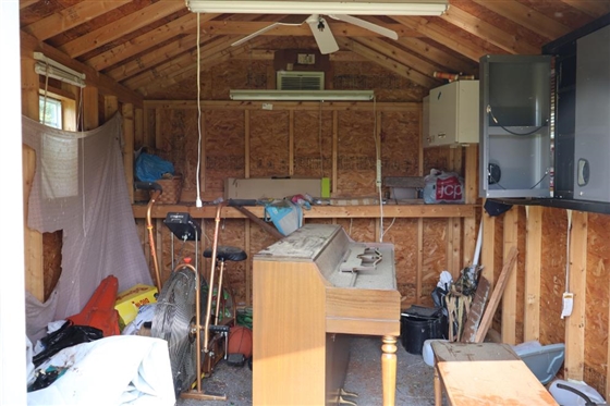 10ft by 12ft Storage Building - Double Doors, and 2 Windows -Window Unit in Top Vent - NOT WIRED - NO Contents - Buyer Must Have Moved 