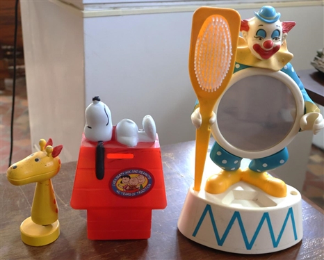 Vintage Childs Plastic Clown Dresser Set - Mirror with Brush - Made in Hong Kong, Snoopy Bank, and Counterpoint Wood Giraffe Paper Holder - Mouth Opens 